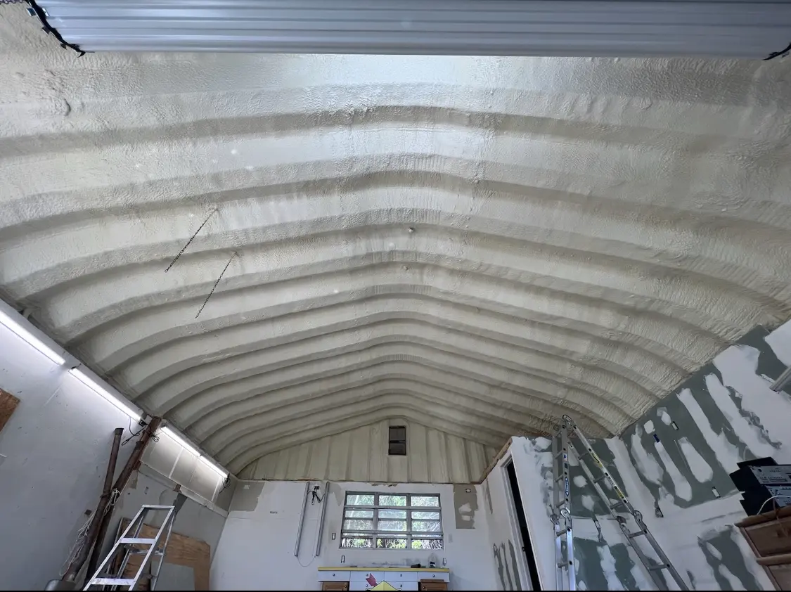 Spray polyurethane foam applied to the underside of a metal roof deck in Altamonte Springs